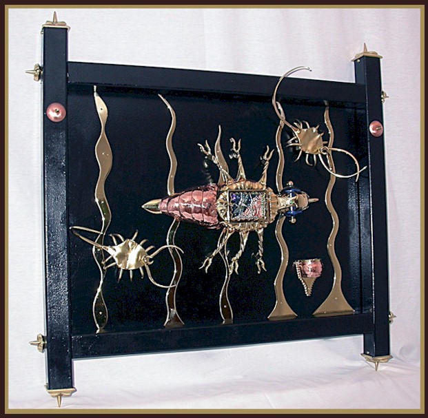 Birth wall sculpture with interactive pendant